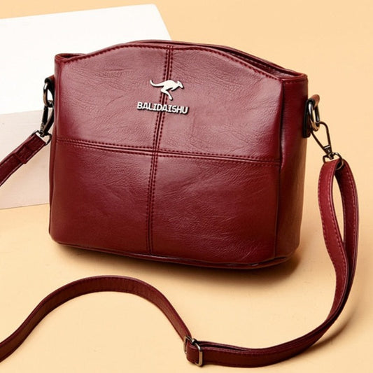 Bolsa feminina Messenger Leather, na cor vermelha, material de PU/Poliéster de alta qualidade. Parcelamento em até 12x no cartão, frete grátis para tod Brasil - Intensely